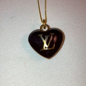Louis Vuitton heart charm on a necklace